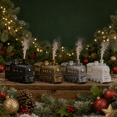 Four decorative Christmas train figurines in black, bronze, silver, and gray, arranged on a wooden shelf with festive greenery, pinecones, red berries, and warm string lights in the background.